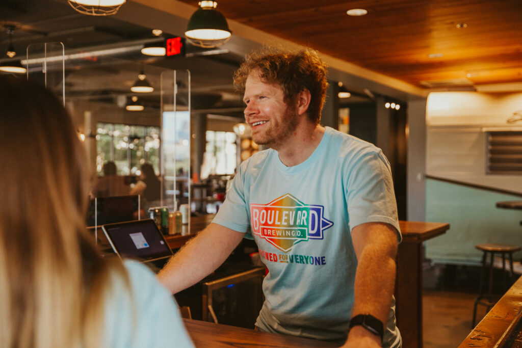 Boulevard bartender in Pride shirt