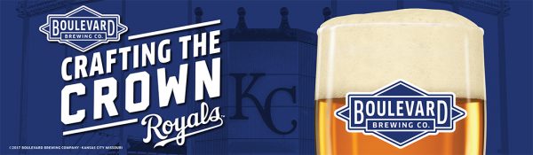 A promotional image for Boulevard Brewing Co. features a glass of beer on the right. On the left, the text reads "Crafting the Crown Royals" with the Boulevard Brewing Co. logo above. In the background, there is a blurry KC emblem.