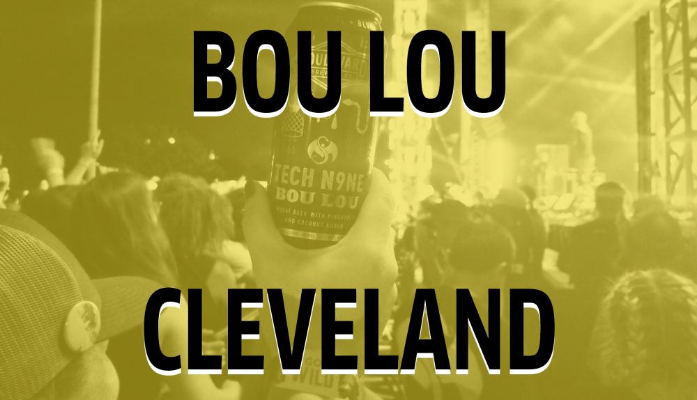 A hand holds up a can with the label "Bou Lou" among a crowd at a live outdoor concert, with stage lights illuminating the background. The text "BOU LOU CLEVELAND" overlays the image.