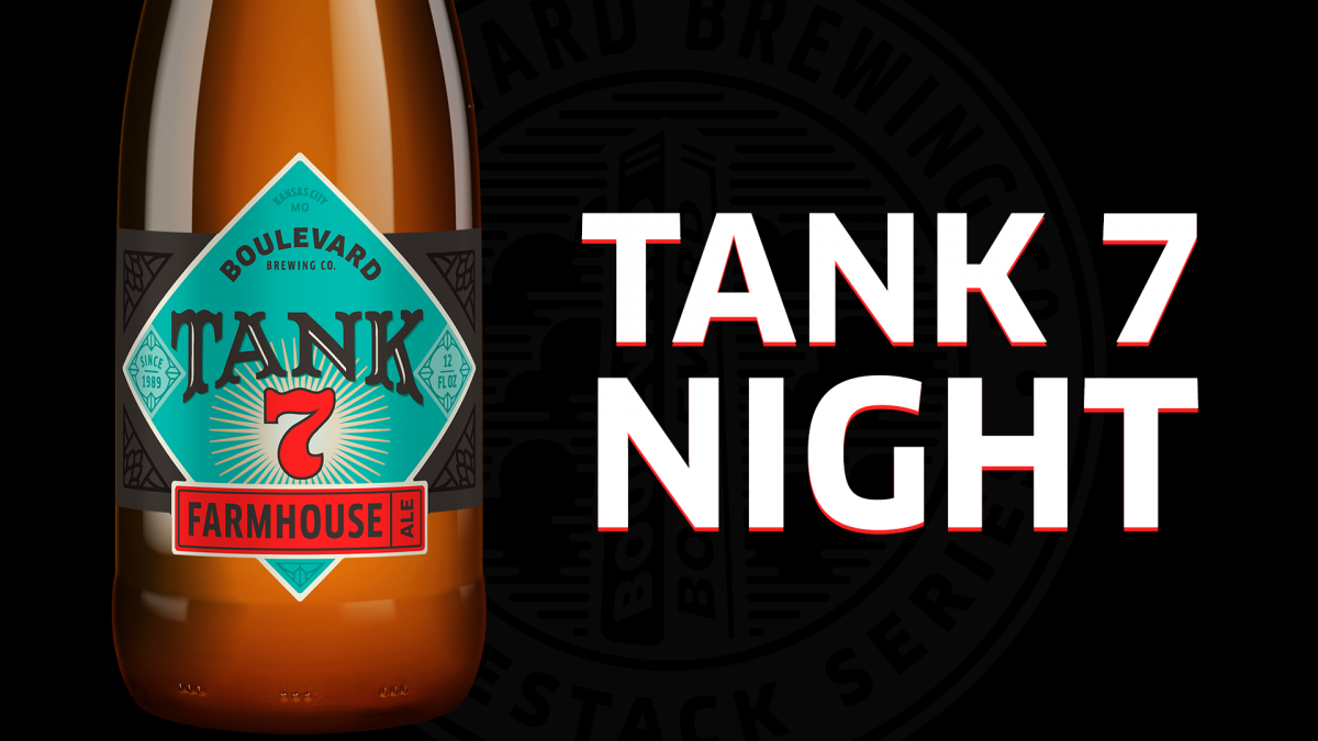 A close-up view of a Boulevard Tank 7 Farmhouse Ale bottle, featuring its green and red label. The background is dark with the words "Tank 7 Night" in bold white and red letters on the right.
