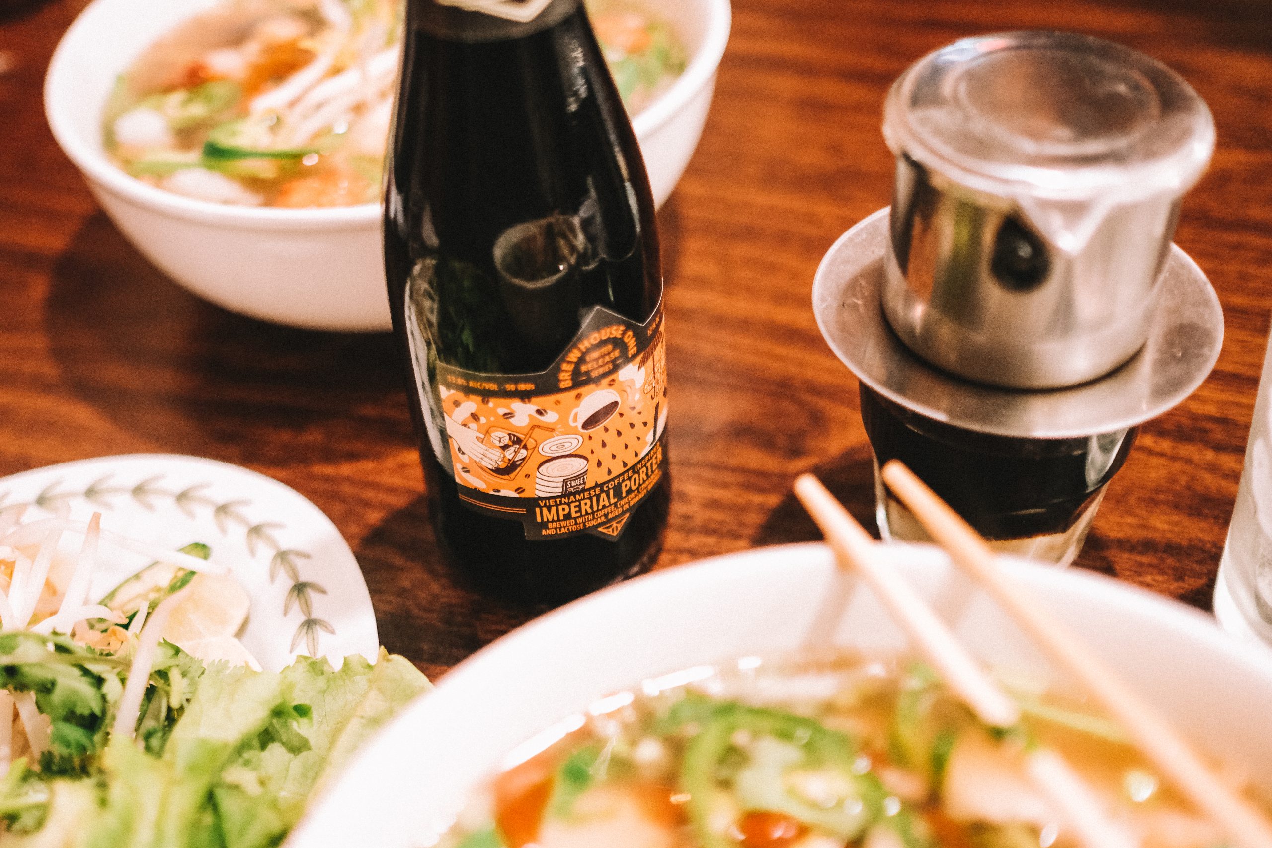 Vietnamese Coffee Inspired Imperial Porter with bowls of PHO