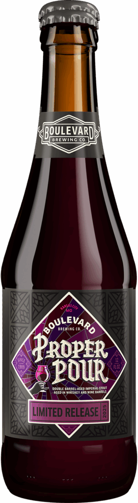 A dark glass bottle of Boulevard Brewing Co.'s Proper Pour 2025, a limited release beer. The label is purple and silver with geometric designs and text indicating it is a double barrel-aged imperial stout.
