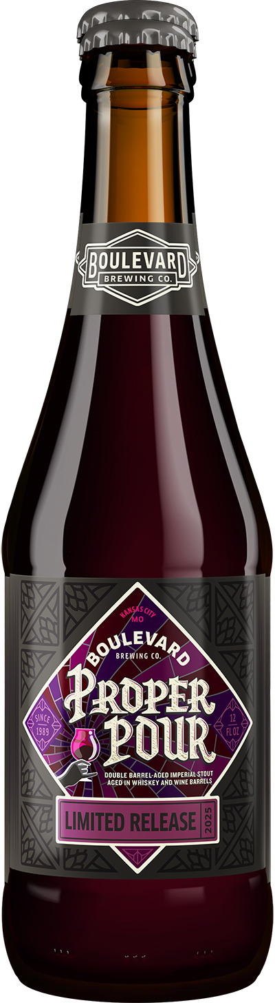 A dark glass bottle of Boulevard Brewing Co.'s Proper Pour 2025, a limited release beer. The label is purple and silver with geometric designs and text indicating it is a double barrel-aged imperial stout.