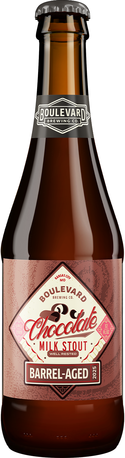 A brown glass bottle of Boulevard Brewing Co.’s Barrel-Aged Chocolate Milk Stout, featuring a vintage-style label in pink and brown tones with decorative fonts and brewery branding.