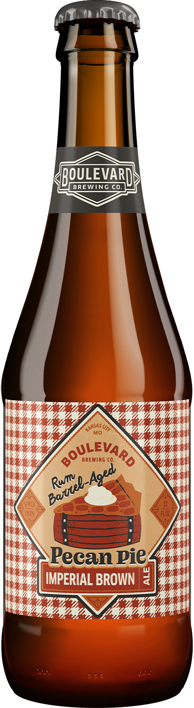 A brown glass bottle of Boulevard Brewing Co. Rum Barrel-Aged Pecan Pie Imperial Brown Ale, featuring a red and cream checkered label with an illustration of a pie and rum barrel.