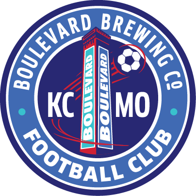 Circular logo for Boulevard Brewing Co. Football Club, inspired by Kansas City, features a tall building labeled "Boulevard," a soccer ball, and "KC MO" within a blue, white, and red color scheme—reflecting the spirit of the Beer Hall and Tours and Rec Center.