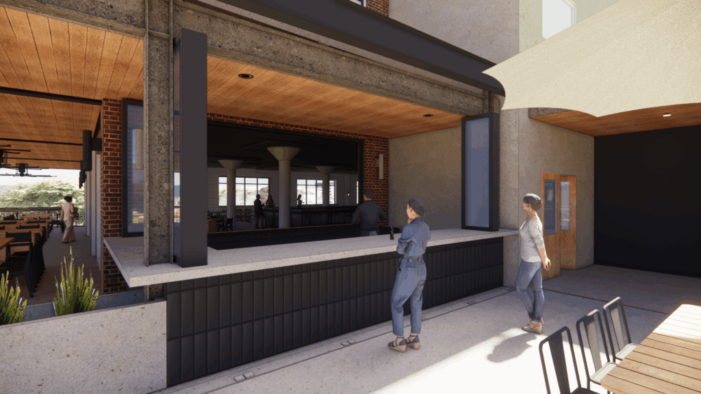 Brewhouse One outdoor bar counter with people standing and sitting nearby, adjacent to a covered patio with tables and chairs. Large open windows connect the bar's interior and exterior, featuring concrete and wood architectural details.