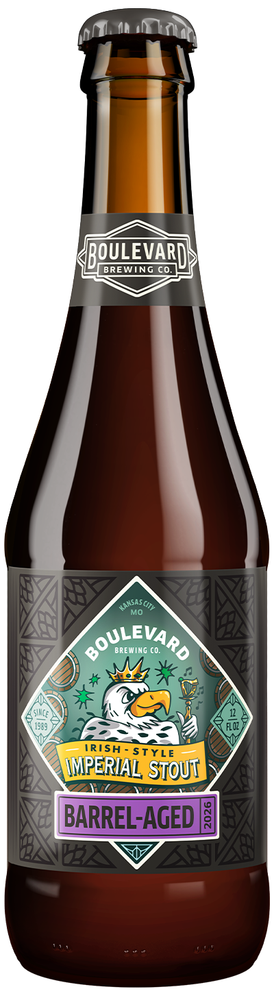 A brown beer bottle with a Boulevard Brewing Co. label, featuring a tiger illustration and text reading “Barrel-Aged Imperial Stout.” The label highlights that the beer is barrel-aged and contains 12 fluid ounces.