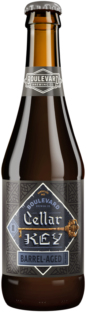 A brown Boulevard Brewing Co. bottle labeled "Cellar Keg Barrel-Aged" with decorative patterns and gold details on a gray label. The cap and neck also feature the brewery’s logo and name.