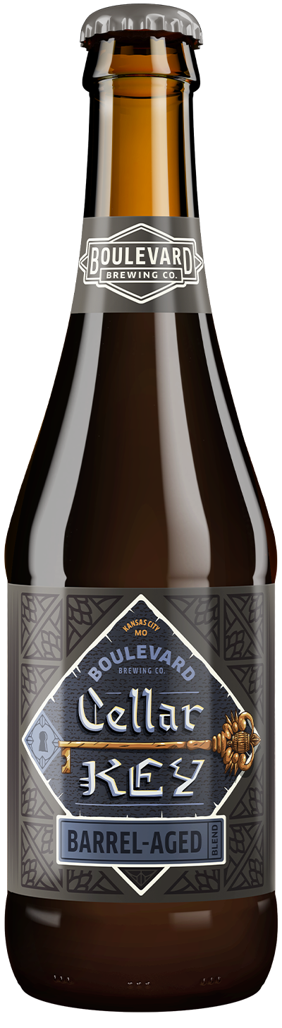A brown Boulevard Brewing Co. bottle labeled "Cellar Keg Barrel-Aged" with decorative patterns and gold details on a gray label. The cap and neck also feature the brewery’s logo and name.